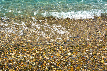 Pebble shore of French Riviera in Nice, natural background