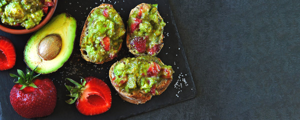 Strawberry guacamole with fitness baguette. Healthy snack. Keto diet Keto snack.