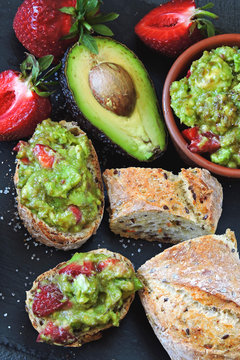 Strawberry guacamole with fitness baguette. Healthy snack. Keto diet Keto snack.