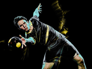 one caucasian handball player young man isolated on black background with speed light painting...