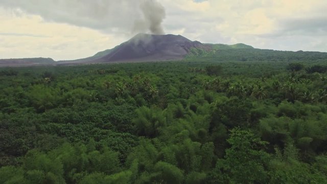 Active Volcanic Crater With Smoke Aerial. Flying Over Thick Rainforest Under Yasur Volcano, Tanna Islan,Vanuatu