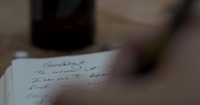 Man Writing Suicide Note