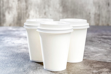 Set of a white styrofoam cups on the table