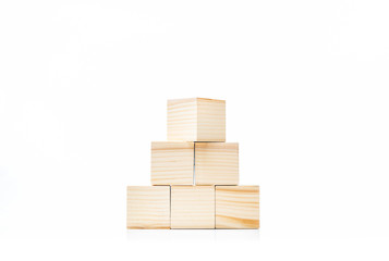Wooden block toy with a pyramid shape
