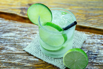 Caipirinha, lemon Fruit Lime Caipirinha of Brazil. Brazilian traditional drink.