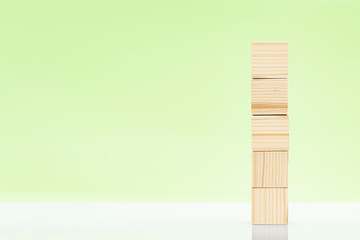 Stack of wooden block toy on the table