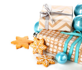 Christmas gifts, decor and cookies on white background