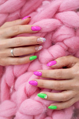 lots of color gloss manicure hands has different blotches