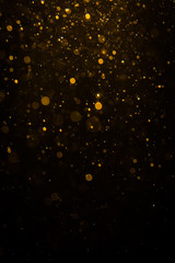 Abstract gold bokeh with black - obrazy, fototapety, plakaty