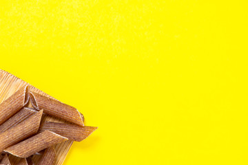  pasta with yellow paper background
