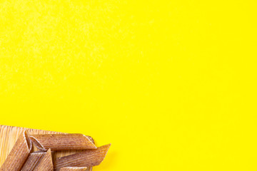  pasta with yellow paper background