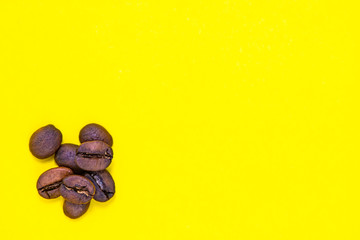 coffee beans and yellow paper background