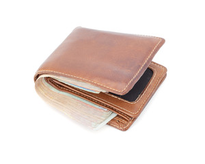 brown wallet with money isolated on white background.