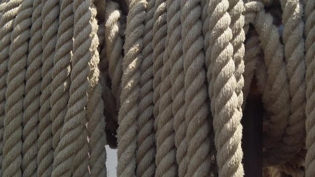 pan down of ropes on tall ship