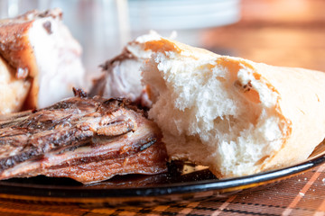  grilled pork and stew homemade sausages with bread and wine. stuffed pies with a lot of flavor