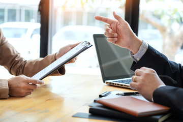 businessman candidate explaining about his profile and conducting a job to managers sitting in job...