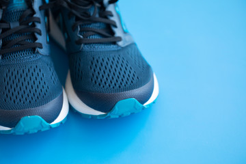 Men's blue sneakers. Fitness and running concept. Fitness background. 