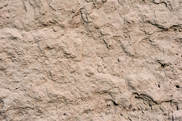 Texture of a concrete wall with cracks and scratches which can be used as a background