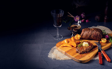 Butter Beef Steak with herbs and potato wedges