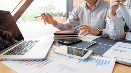 Working business man, team of broker or traders talking about forex on multiple computer screens of stock market invest trading financial graph charts data analysis.
