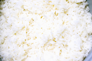 Background and texture of cooked rice to look good and clean to ready to eat from a rice cooker.