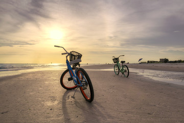 Fototapeta na wymiar Sunset beach and bicycle in Siesta Key beach, Sarasota, Florida