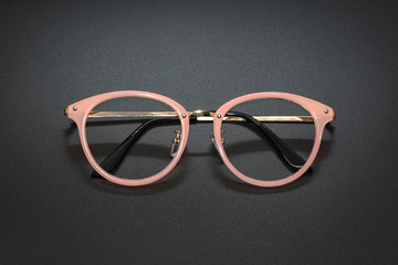 Image of modern fashionable spectacles isolated on black background, Eyewear, Glasses