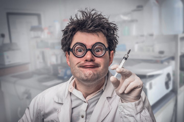 Crazy doctor performing experiments in hospital