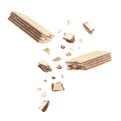 Delicious broken sweet wafer on white background