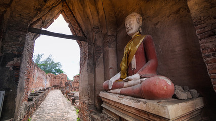 Wat Nakhon Luang Castle, Phra Nakhon Luang , Thailand. July, 2019. The old buddha statue in the old castle.