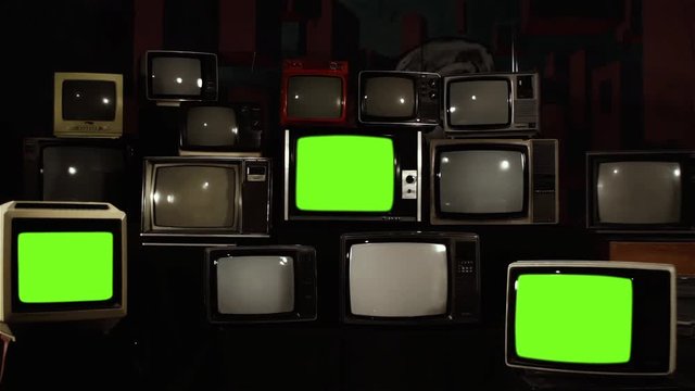 Three Retro Televisions Turning On Green Screen. High Contrast Tone. 