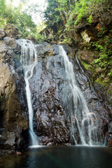 Scenic view on Klong Nonsi Waterfall in the jungle a sunny day. Koh Chang, Thailand.