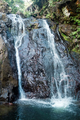 Scenic view on Klong Nonsi Waterfall in the jungle a sunny day. Koh Chang, Thailand.