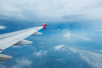 Fototapeta premium high view image through airplane window with nice clear blue sky
