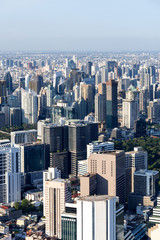 Fototapeta premium The Metropolitan Bangkok City - Aerial view urban tower Bangkok city Thailand on April 2019 , blue sky background , Cityscape Thailand