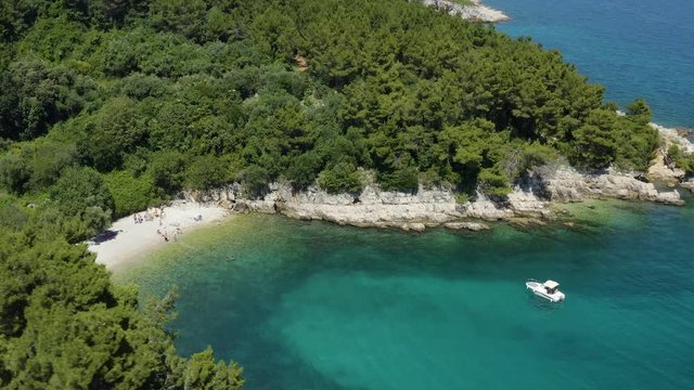 Aerial of hidden beach in Rabac Croatia in summer travel season