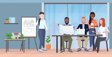 architects team working with blueprints mix race engineers discussing new building project during meeting teamwork concept modern draftsman studio interior horizontal full length