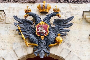 Double-headed eagle - the old coat of arms of the Russian Empire on gate of Peter and Paul Fortress in St. Petersburg, Russia