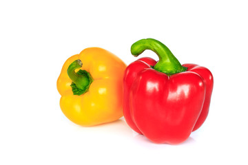 red and yellow bell pepper on white background.
