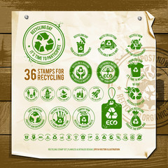 vector set of recycling symbols, collection of environment friendly signs, go green design elements for eco friendly themes, the illustration contains an old textured paper and vintage wood background - 281196717