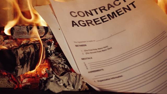 Paper contract burned in the fireplace