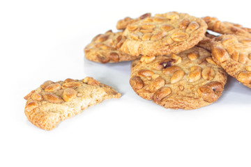 peanut cookie broken on white background.
