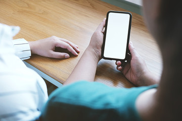 Friends watching social media in a smart phone. social network concept with smart phone. white screen for mockup.