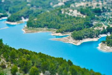 Fototapeta premium Beautiful view of the blue water reservoir, mountains and river near the castle of Guadalest .