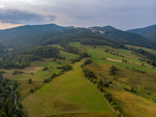 Mountain landscape with forests and meadows_3
