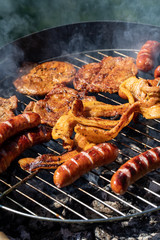 Unhealthy but tasty grilled sausages and meat