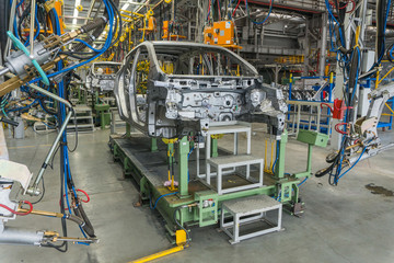 Assembly of the automobile body at the industrial plant of cars