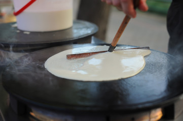 Fototapeta na wymiar Pancakes Crepe Dessert . Street food