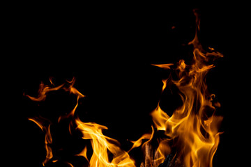 Obraz premium strong fire flames on black isolated background