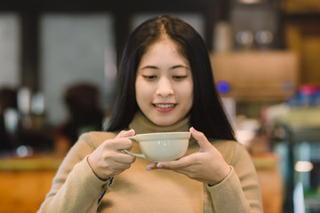 Young asian female in coffee shop